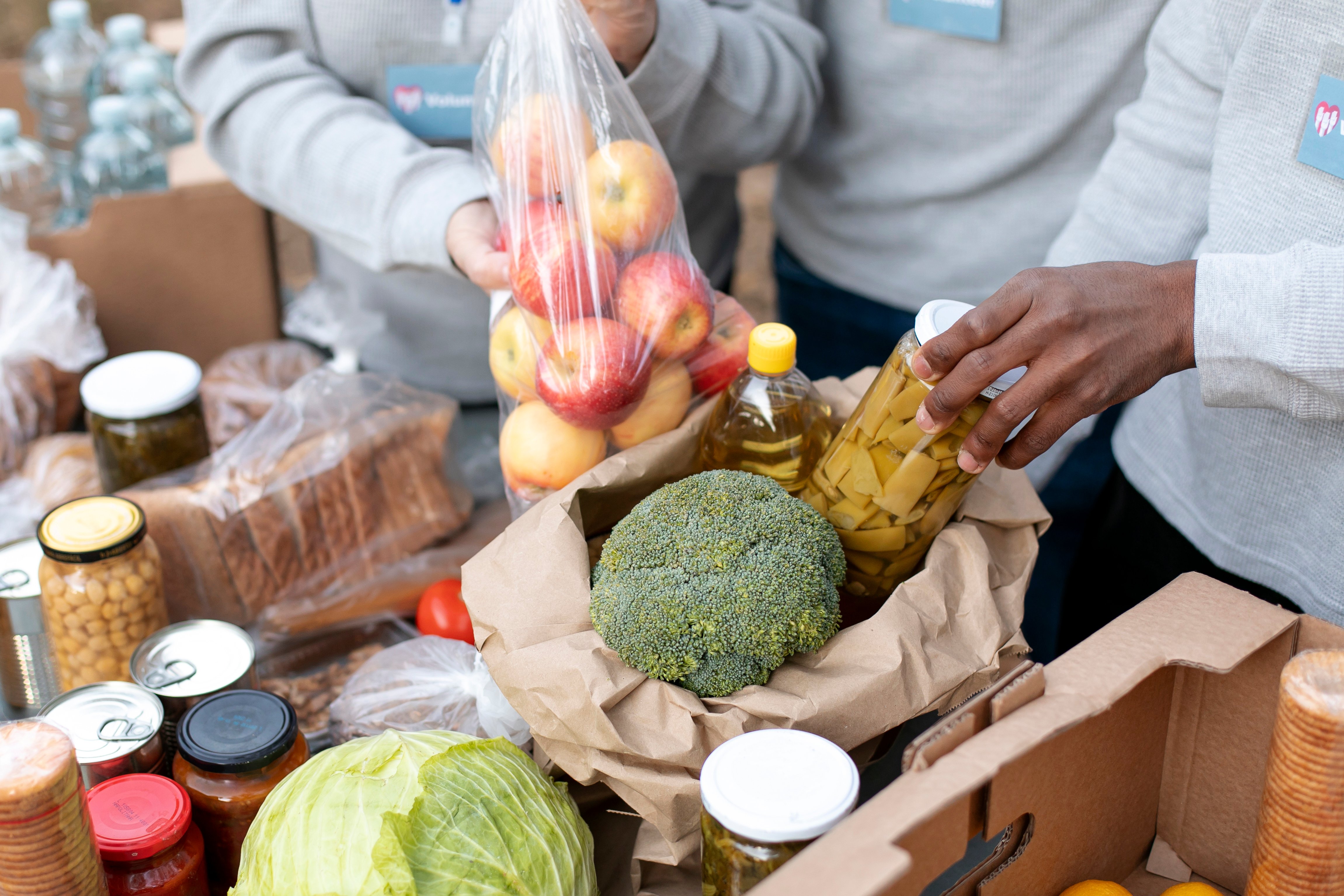 close-up-volunteers-collecting-food-donations