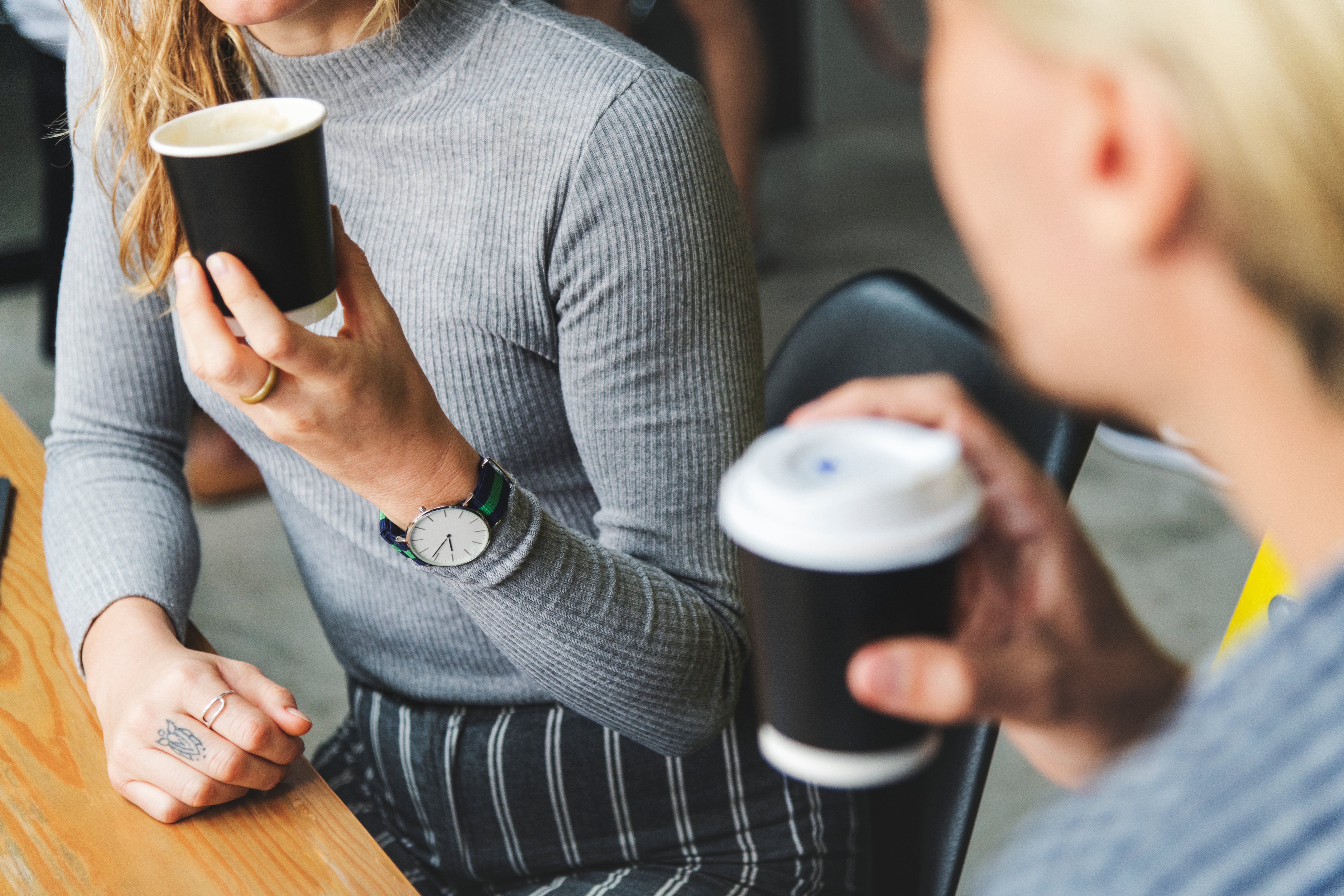 friends-enjoying-hot-coffee-together